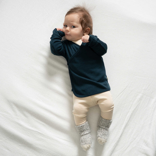 gilet cardigan bébé en 100% laine merinos par Minimalisma, couleur bleu sarcelle